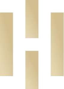 A logo featuring a stylized gold letter "H" on a transparent background. The letter is formed by three vertical gold bars of equal width and height, interrupted by a horizontal gold bar in the middle. The overall design has a sleek and modern appearance, perfect for businesses like Door Installation Buchanan County.